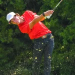 Maxwell Ford of UGA men's golf hits a chip shot from the bunker