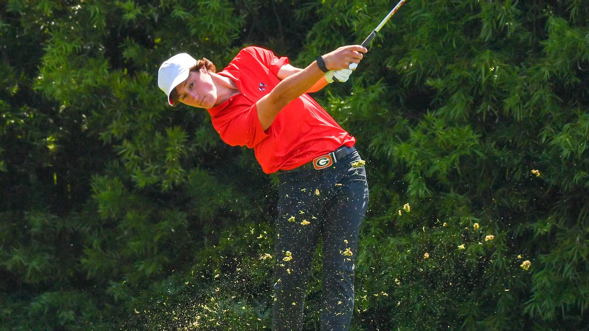 Maxwell Ford of UGA men's golf hits a chip shot from the bunker