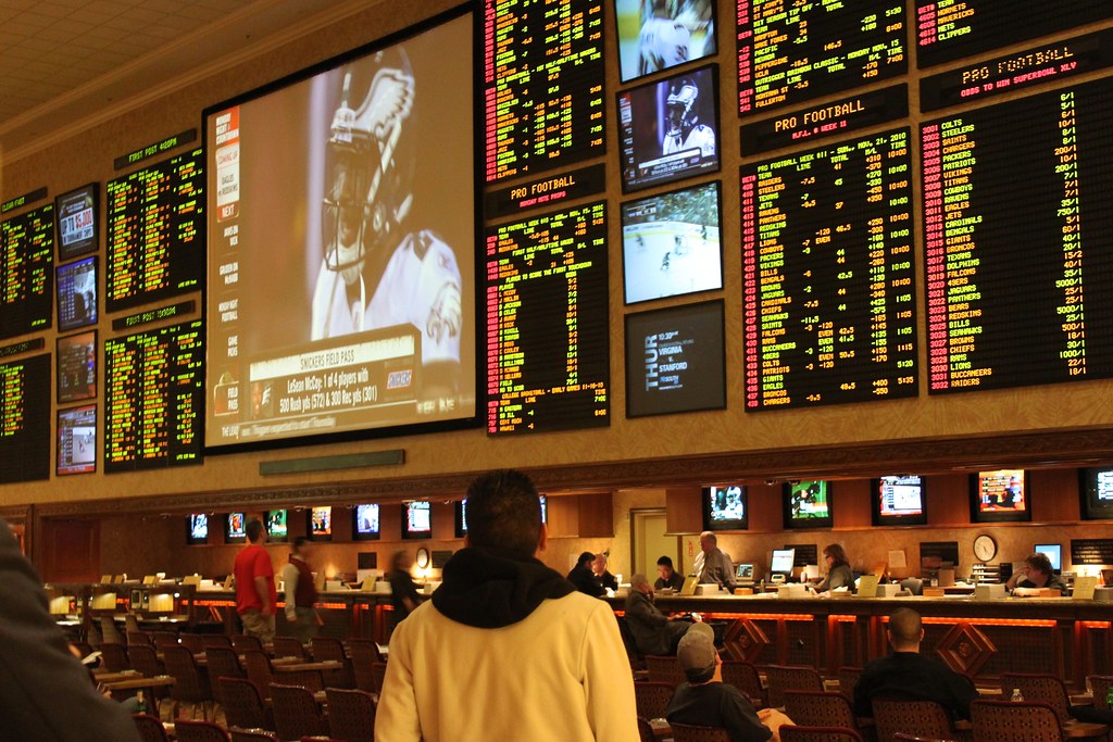 A man standing in a sportsbook in Las Vegas